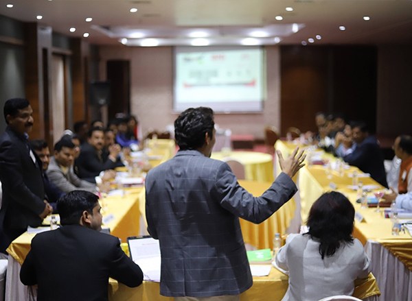 Manish Jain conducting a corporate training session