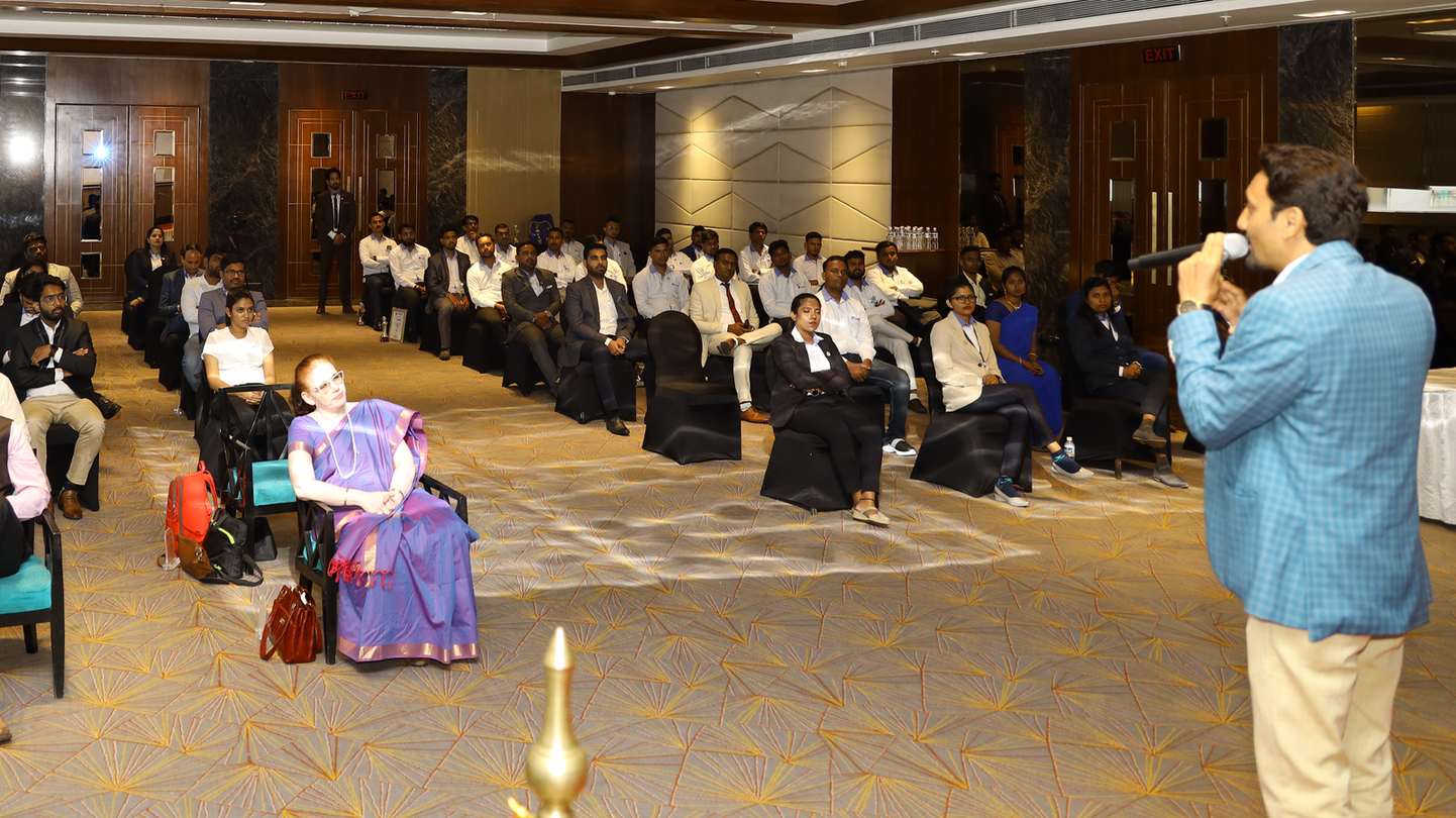 Manish Jain speaking at a business seminar