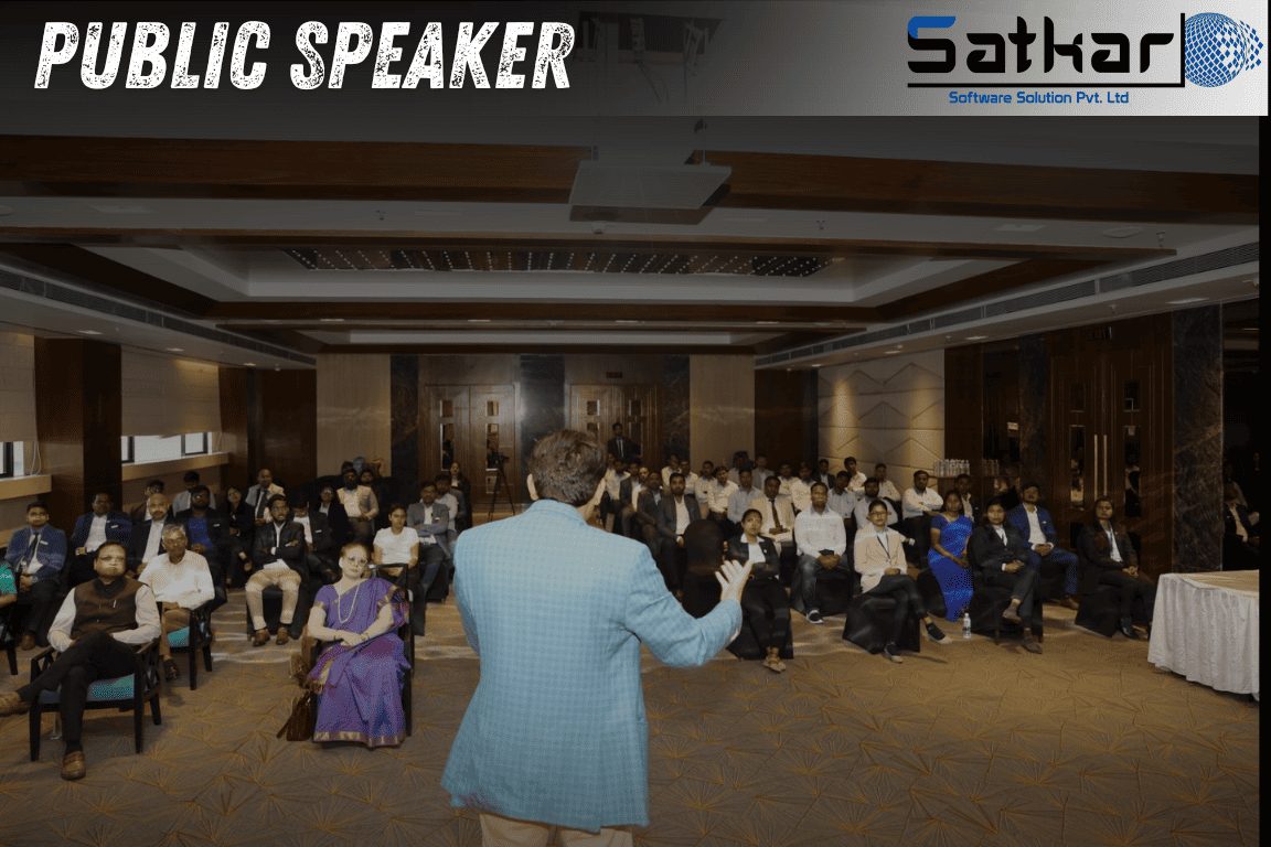Manish Jain speaking to a large corporate audience