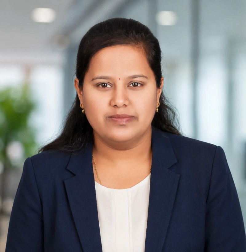 Prajakta Kumbhar, Web Developer, in a navy blazer