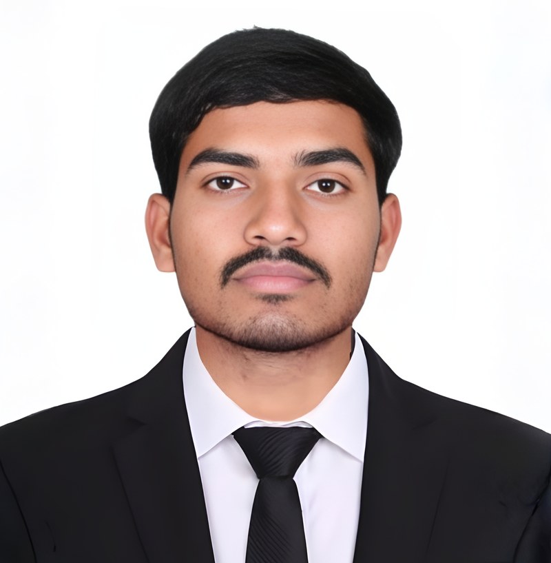 Raviraj Kadam, Web Developer, in a black suit and tie